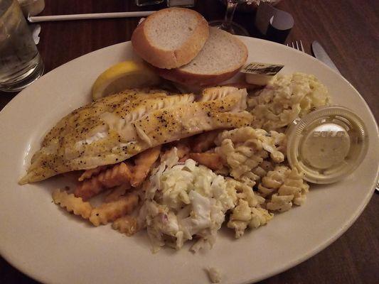 Broiled fish with fries, mac salad, potato salad, and coleslaw.