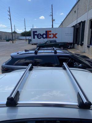 Grey and black car roof racks