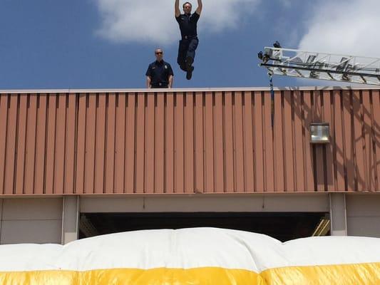 Fireman jumping off building