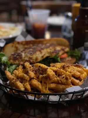 Loaded fries with a walleye sandwich! How does this place only have two and a half stars????