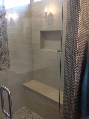 Sicis glass & porcelain tile shower. Bathroom design, material and remodel completed by ABT Home Renovations