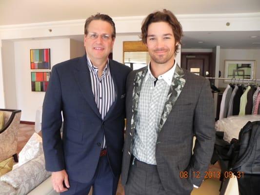 Cj Wilson of the Los Angeles Angels with Owner Chuck Hellman in New York City trying on his new Camo Detailed Suit