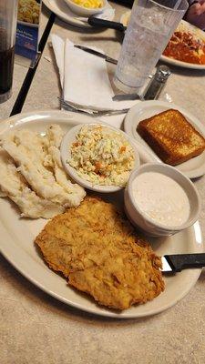 Chicken fried steak,  cole slaw, mashed potatoes,  Texas toast