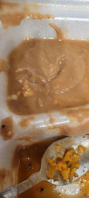 Delivered refried beans in Styrofoam container