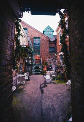 The outside patio on the side of the coffee shop. A quaint little place to relax while enjoying some coffee and food from Molly's