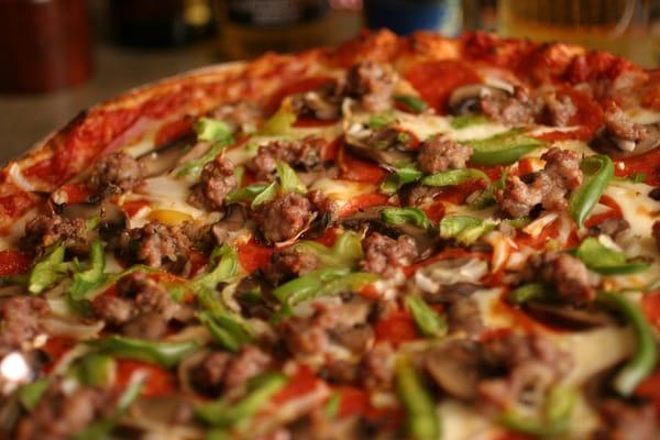 Award winning deluxe pizza - pepperoni, sausage, ham, onions, green pepper & mushrooms.