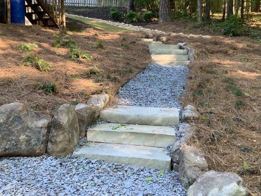 Stone steppers with slate chips.