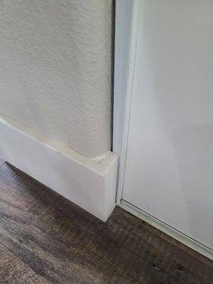 Bad calking and paint on floors