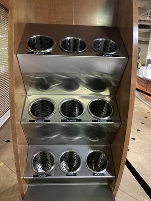 Empty bins for utensils that they never refill.