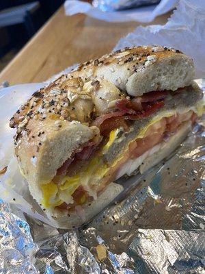 Bagel- egg cheese bacon sausage sandwich