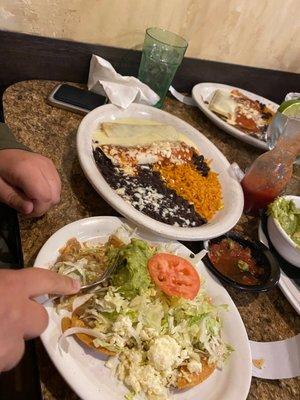 Vegetarian tostada and bean burrito I believe?