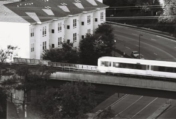 Metro Trains are visible from the Eastern side of the building.