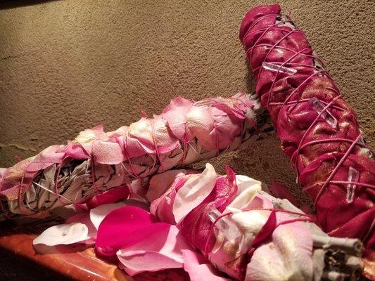 Hand wrapped rose smudge bundles.