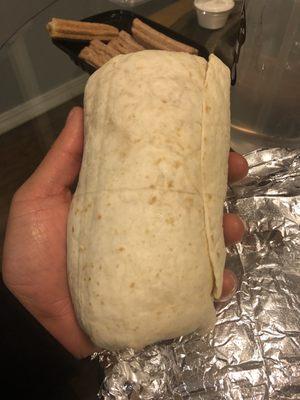 I have a large hand, this shows how big the burrito is.