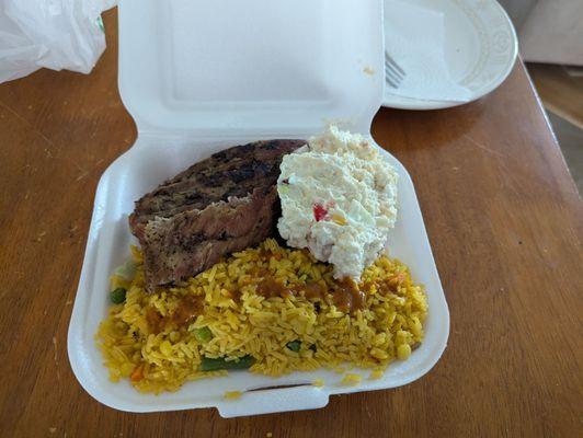 Ribs with yellow rice and potato salad - a whopping 7.99! What a bargain!