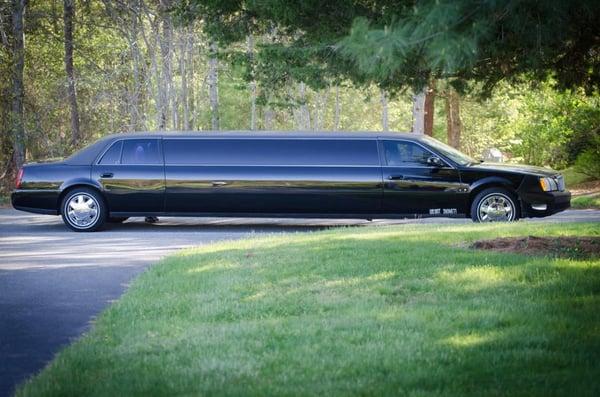 Cadillac Limousine: 10 Passengers This vehicle features:  Customized Couches, Leopard Print Carpet, Privacy Partition, 2 Wet ...