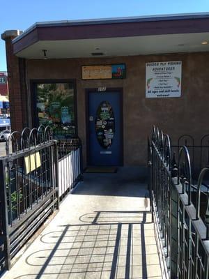 Front door up on the second floor.  Off of the corner of main and collage.