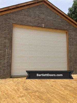 14ft tall residential garage door for RV garage installation by Bartlett Garage Doors, Memphis, TN