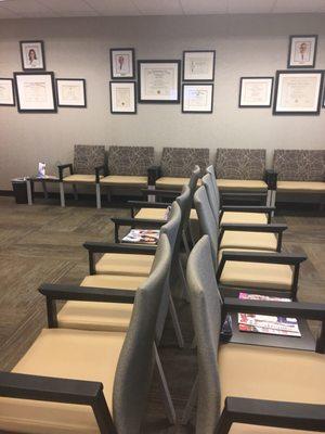 Another nother view of waiting room with some of those physicians degrees on the walls. Nice touch.