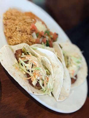 Shrimp tacos with rice/beans.