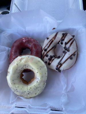 Lemon poppyseed, red velvet, and cannoli donuts