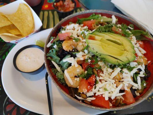 Kale salad with the addition of shrimp.