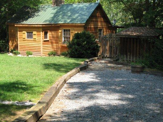 Rustic River Cabin front yard and driveway, Shenandoah River is backyard