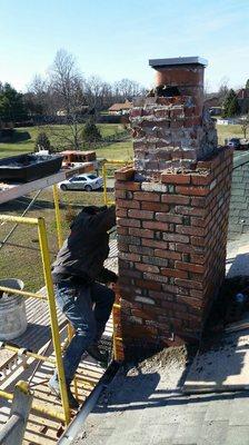 Rebuilding an old damaged chimney from the roof up