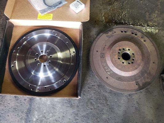 New and old flywheel for 1999 Ford Mustang GT.