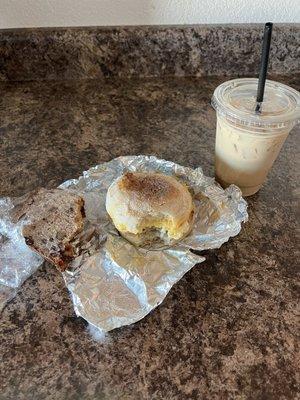 Banana but bread, sausage breakfast sandwich, iced vanilla latte.