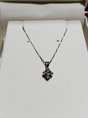 Solitaire diamond ring converted to pendant