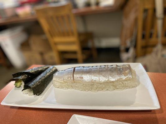 Battera roll (mackerel pressed sushi) $10 and one order of unagi-avocado hand rolls $6.5.