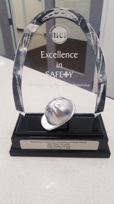 Excellence in Safety award.  Awarded by MCASF.  We earned 2nd place in our category for our safety record.