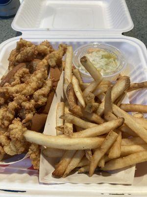 Clam strip roll with fries and cole slaw.