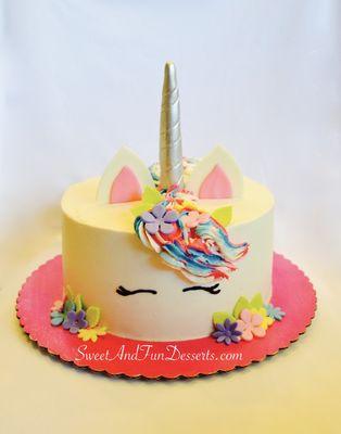 Unicorn Cake in buttercream with marshmallow fondant horn, ears and flower accents