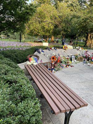 People bring pictures, flowers & remembrances @ 9/11 Memorial/The Garden of Remembrance @ The Boston Public Gardens in Boston