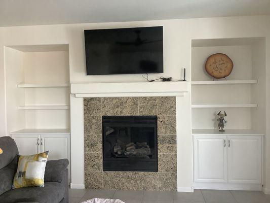 Cabinets and shelves built by Classy Closets.