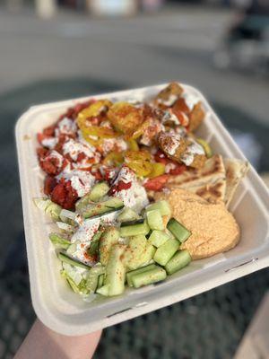 Mix plate with chicken and falafel over rice