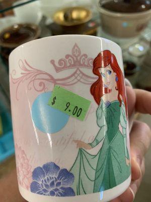 A single Disney coffee cup. They had a bowl and plate also priced at $9 EACH.