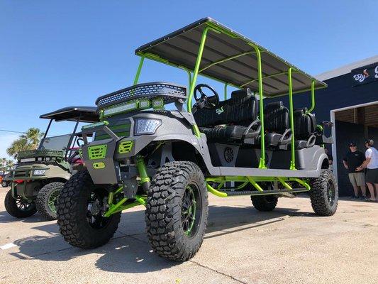 T-Rex, our monster 8-seater cart. He roars through town and is sure to turn a lot of heads!