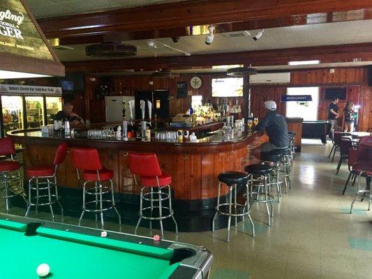 Main bar area with two pool tables