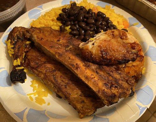 My hubby's plate with ribs, chicken, rice and beans.