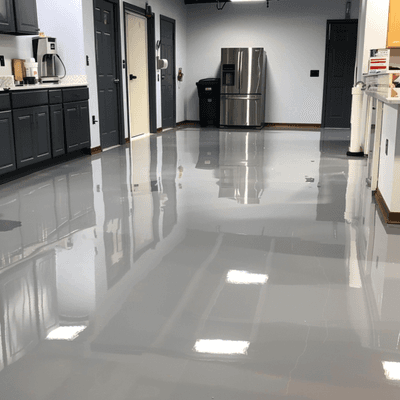 Solid light grey epoxy floor.