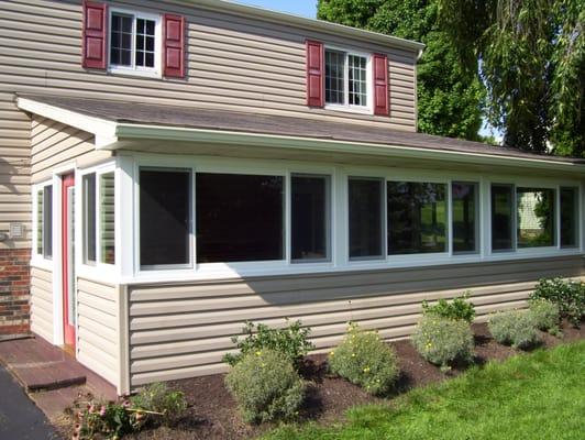 Porch enclosures protect you & your belongings from the elements & allow you to enjoy your space year-round!