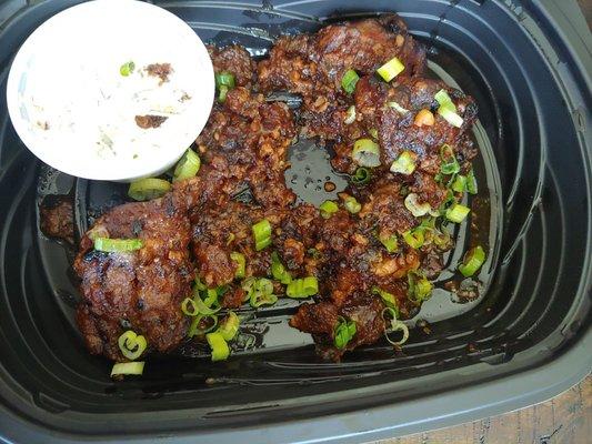 Japanese fried chicken appetizer. Gooey and vinegary. Chicken a little too chewy. Would not recommend.