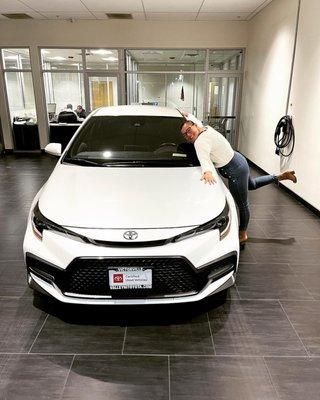 My mom with her new car!