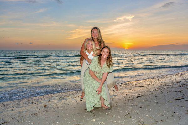 Three sisters and a soothing sunset.  What better way to capture time together