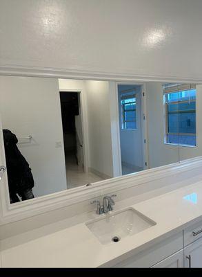 bathroom trim around mirror installed