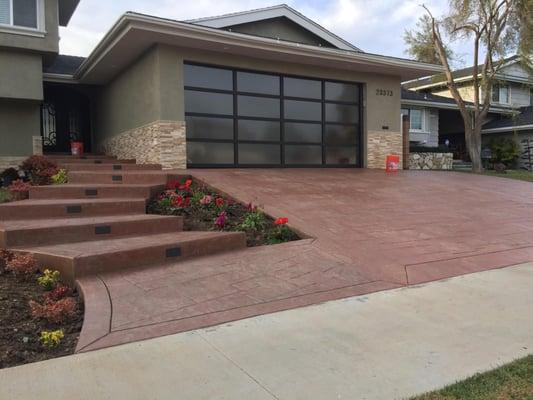 Finished driveway and stairs with color and stamp.