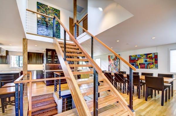 Ballard whole home renovation. Custom staircase and rails. Open concept with minimalist design aesthetic.